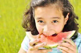Eating watermelon outside